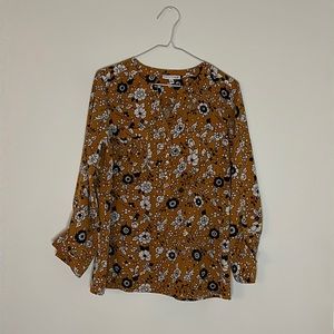 Quarter length floral dress shirt.